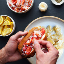 Load image into Gallery viewer, lobster roll being made
