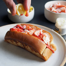 Load image into Gallery viewer, lemon squeeze on lobster roll
